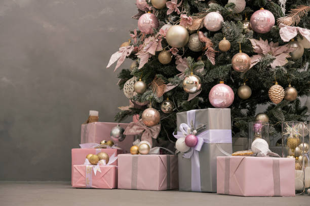 istock Christmas tree and gifts on a background. 1859564201