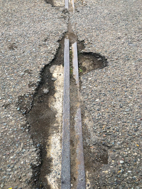 istock Vertical photo of Destroyed bridge expansion joint system 1859565782
