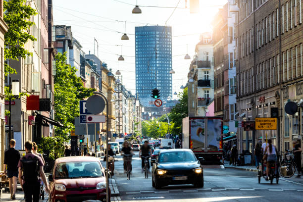 Street with traffic  in Copenhagen Street with traffic  in Copenhagen city hochhaus stock pictures, royalty-free photos & images