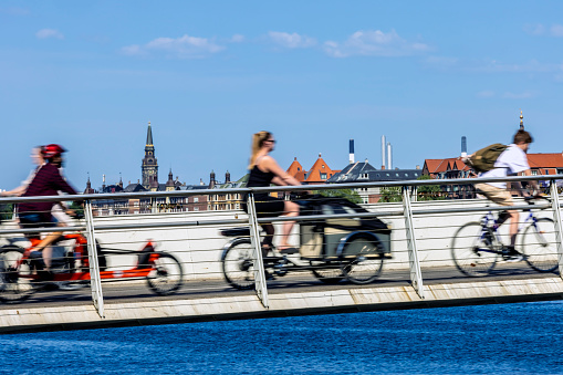Cyclists on a bridge in Copenhagen. People are not recognizable