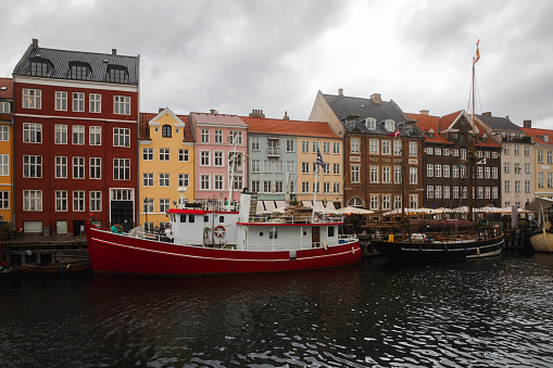 Copenhagen Nyhavn panorama city with boats and many small colorful houses