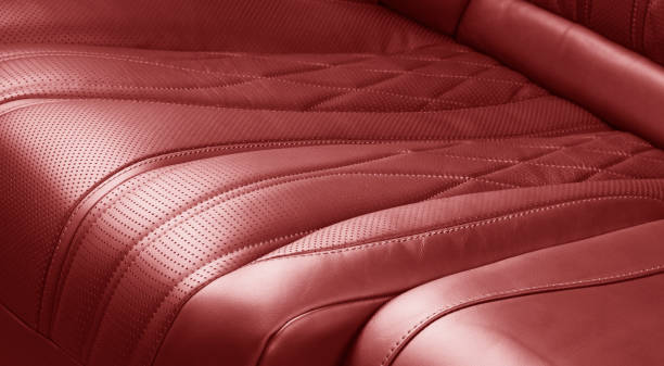 istock Car inside. Interior of prestige modern car. Comfortable leather seats. Red perforated leather. Back passenger seats. 1859590897