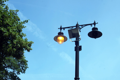During daylight street lamps are on for some reason and wastes energy