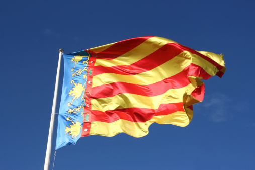 Flag of Comunidad Valenciana, region in Spain. Moving in the wind.