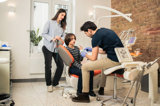 istock Teenage boy having a dental checkup 1859631850
