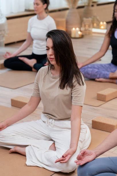 istock Group of women at yoga class 1859647473