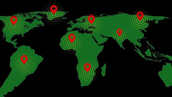 World map with red location markers indicating global hotspots or points of interest on a dark background.