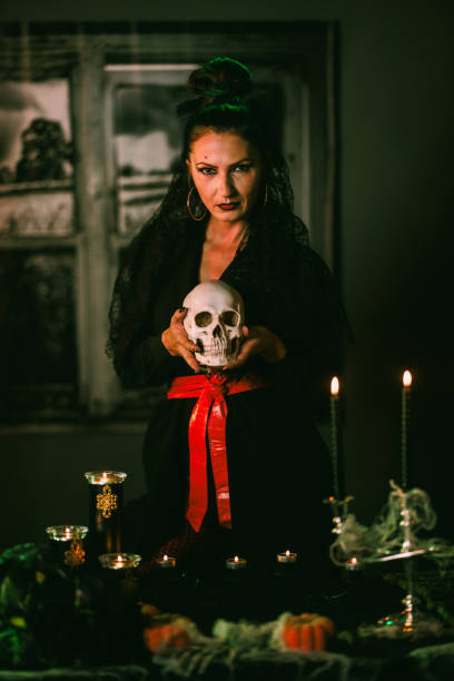 istock Halloween Woman With Skull 1859674308