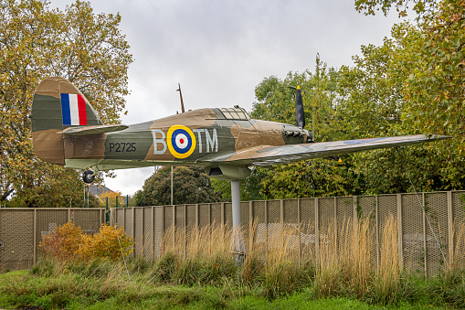 Hendon, London, England - November 4th 2023:  Restored Hurricane fighter plane put up in the public area as a advertisement for the RAF museum in Hendon