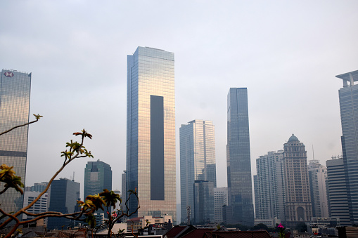 View of high-rise buildings in the central business district around Sudirman and Kuningan Jakarta at sunrise in Central Jakarta, Indonesia on March 24, 2023