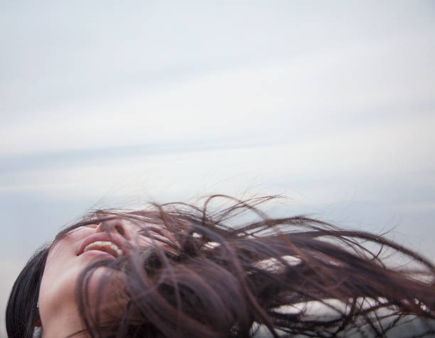 Close-Up Of Woman With Tousled Hair