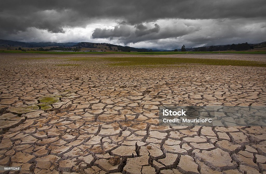 About to rain - Drought Drought land with dense cloudy pattern, apparently rain is about to happen. Climate Change Stock Photo