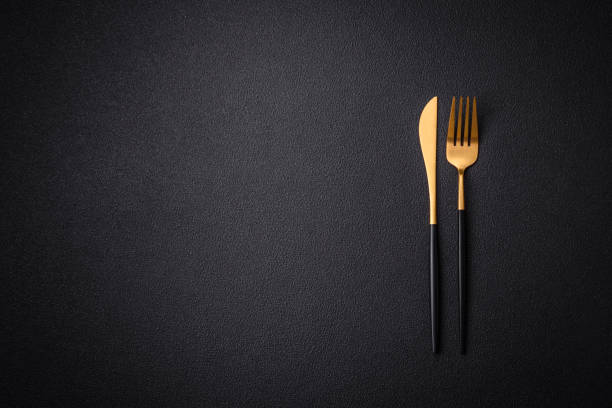 istock Kitchen knife and fork made of steel with copy space 1859702855