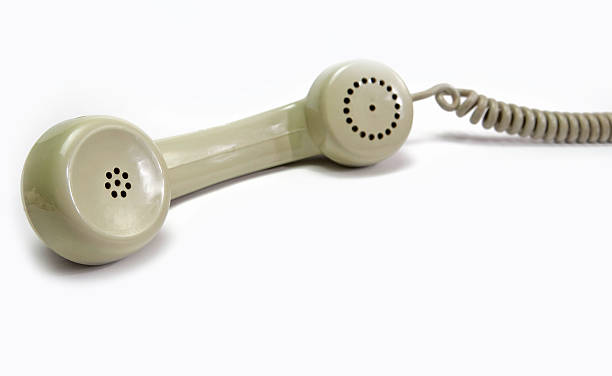 istock Vintage telephone receiver isolated on white background 185970926