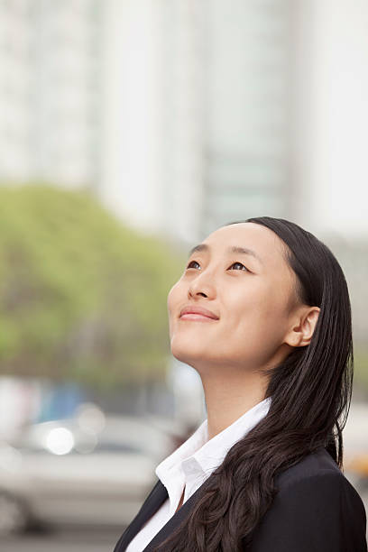 istock Young Businesswoman Looking Up 185972338