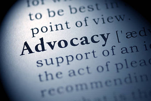 Closeup view of the definition of advocacy stock photo