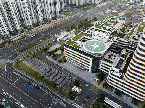 The helicopter takes off from the helipad on the city