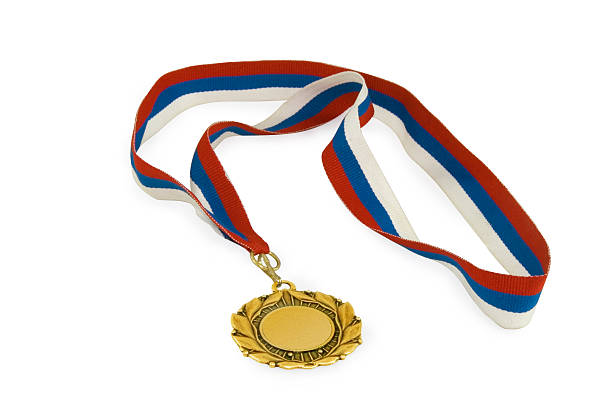 istock gold medal with ribbon isolated over white background 185974354