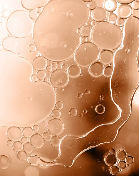 istock Bright green colorful bubbles on water surface in abstract background 1859750504