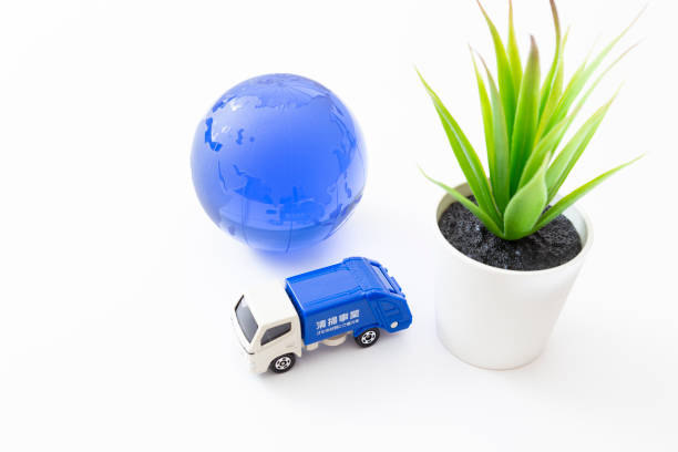 istock Garbage truck and the earth. 1859766334