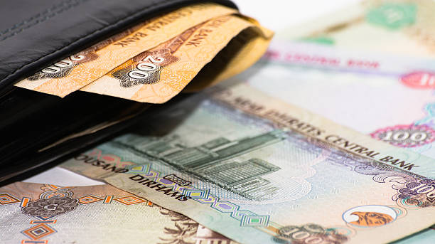 istock Wallet with UAE curency cash 185978042