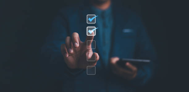 istock Business performance checklist, businessman using laptop doing online checklist survey, filling out digital form checklist, take an assessment, questionnaire, evaluation, online survey, online exam. 1859794829