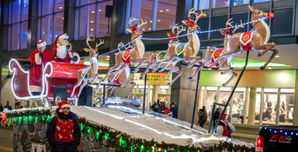 Windsor, Ontario, Canada - December 02, 2023:  The Santa Clause float in the 2023 edition of the Windsor Santa Claus Parade.   This photo was taken on Riverside Drive, directly in front of St Clair College.