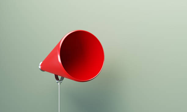 istock Red Megaphone  In Front Of Gray Wall 1859802007