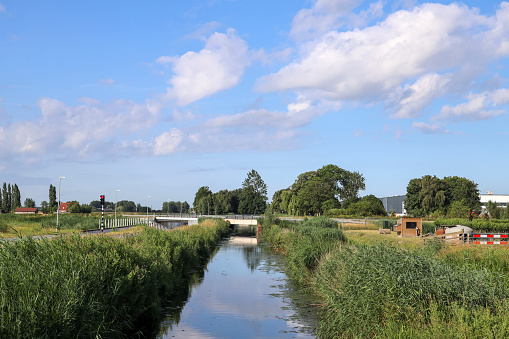 Pastures with farms in the future Fifth Village of the Zuidplaspolder in Moordrecht in the Netherlands