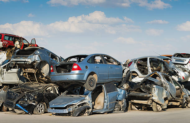 Recycling of cars Scrap cars awaiting recycling car junkyard stock pictures, royalty-free photos & images