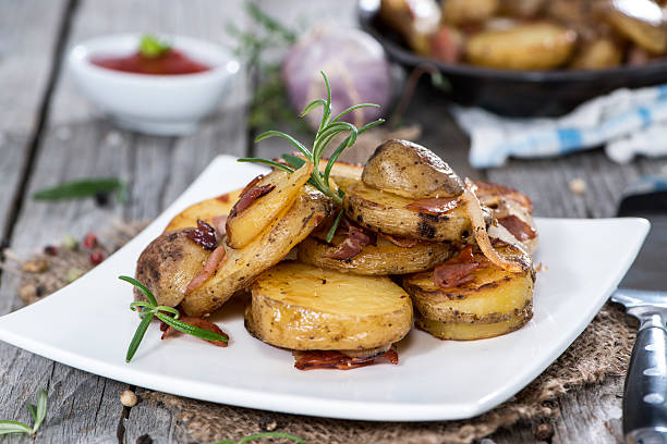 istock Heap of Roasted Potatoes 185981145
