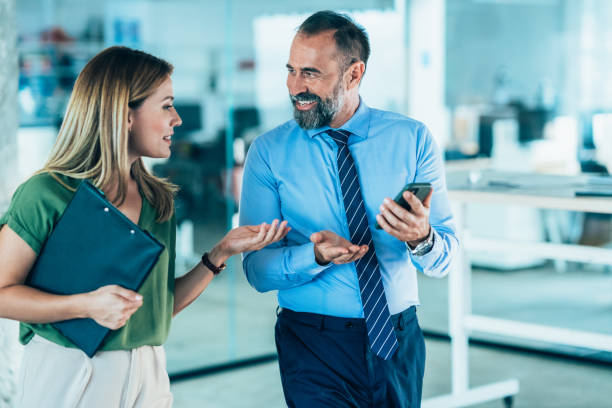 istock Business colleagues talking in the office 1859816825