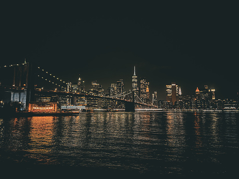 View of Brooklyn Bridge and Lower Manhattan at twilight. New York City. USA
