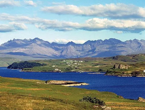 The Cuillin Hills appear above Loch Harport looking south on the Islke of Skye. The Cuillin are mountains for the true climber.