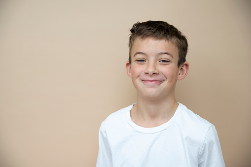 Portrait of a handsome little boy smiling to camera