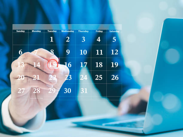 istock Businessman making red circles on important days on the calendar Important appointment dates, reminders or schedules for meetings or tasks, deadlines or planning appointments for efficient work time. 1859845713