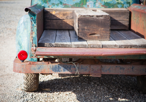 Abstract of Old Rusty Antique Truck Bed in a Rustic Outdoor Setting.