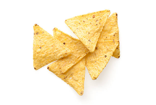 Nachos Food and snacks: mexican nachos, isolated on white background tortilla chip photos stock pictures, royalty-free photos & images