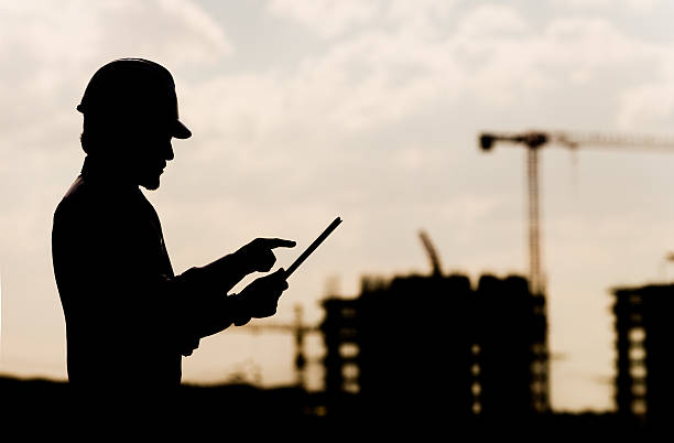 Construction manager and digial tablet stock photo