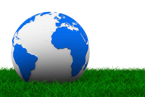 globe on grass. Isolated 3D image