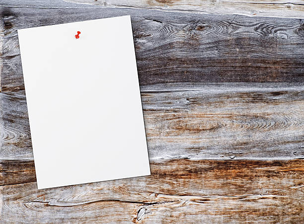 istock Paper on wooden  wall 185988799