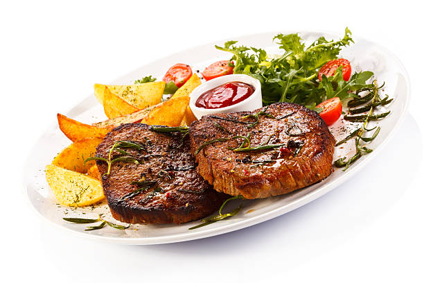 istock Grilled meat, potatoes and vegetables 185988877