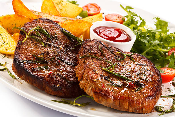 istock Grilled meat, potatoes and vegetables 185988904