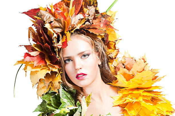 istock young woman with yellow leaves 185988944