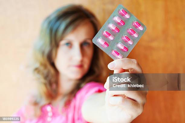 Girl And Pills Stock Photo - Download Image Now - Acetylsalicylic Acid, Adult, Adults Only