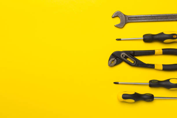 istock Set of tools on color background, top view 1859901864