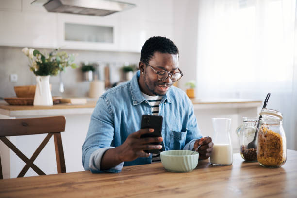 istock Young black man preparing healthy breakfast indoors at home 1859901885