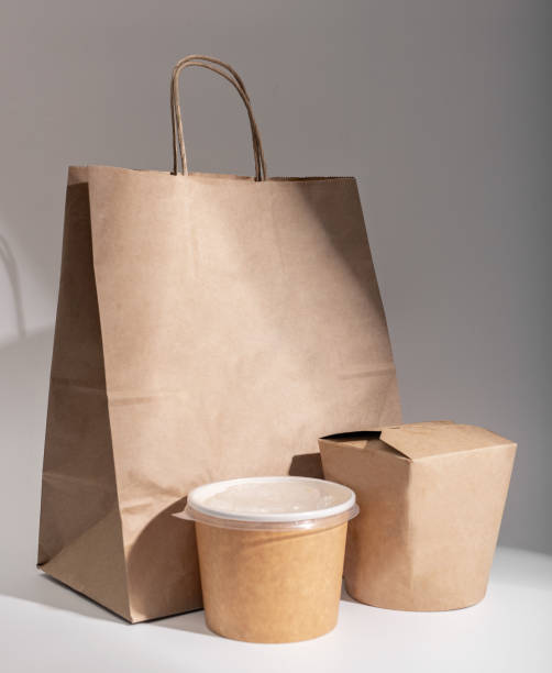 istock Takeaway kraft packages. Different take-away delivery boxes, bag 1859957261