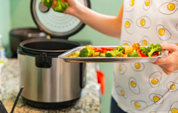 istock Close up of person using a slow cooker 1859958745