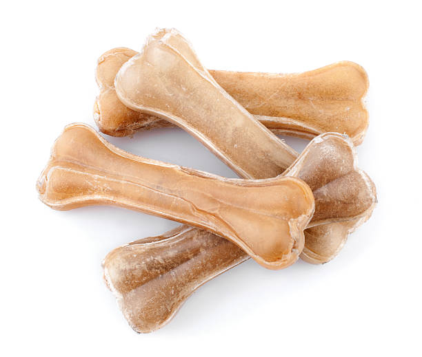 Dog treats Artificial dog bones isolated on white background dog bone photos stock pictures, royalty-free photos & images